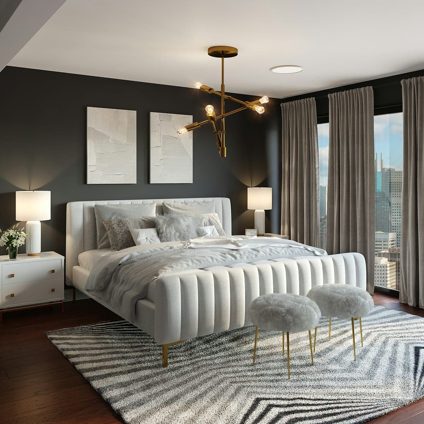 Luxury master bedroom with a channel-tufted bed and brass pendant